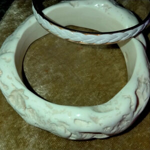 Faux ivory and braided leather on copper bracelets